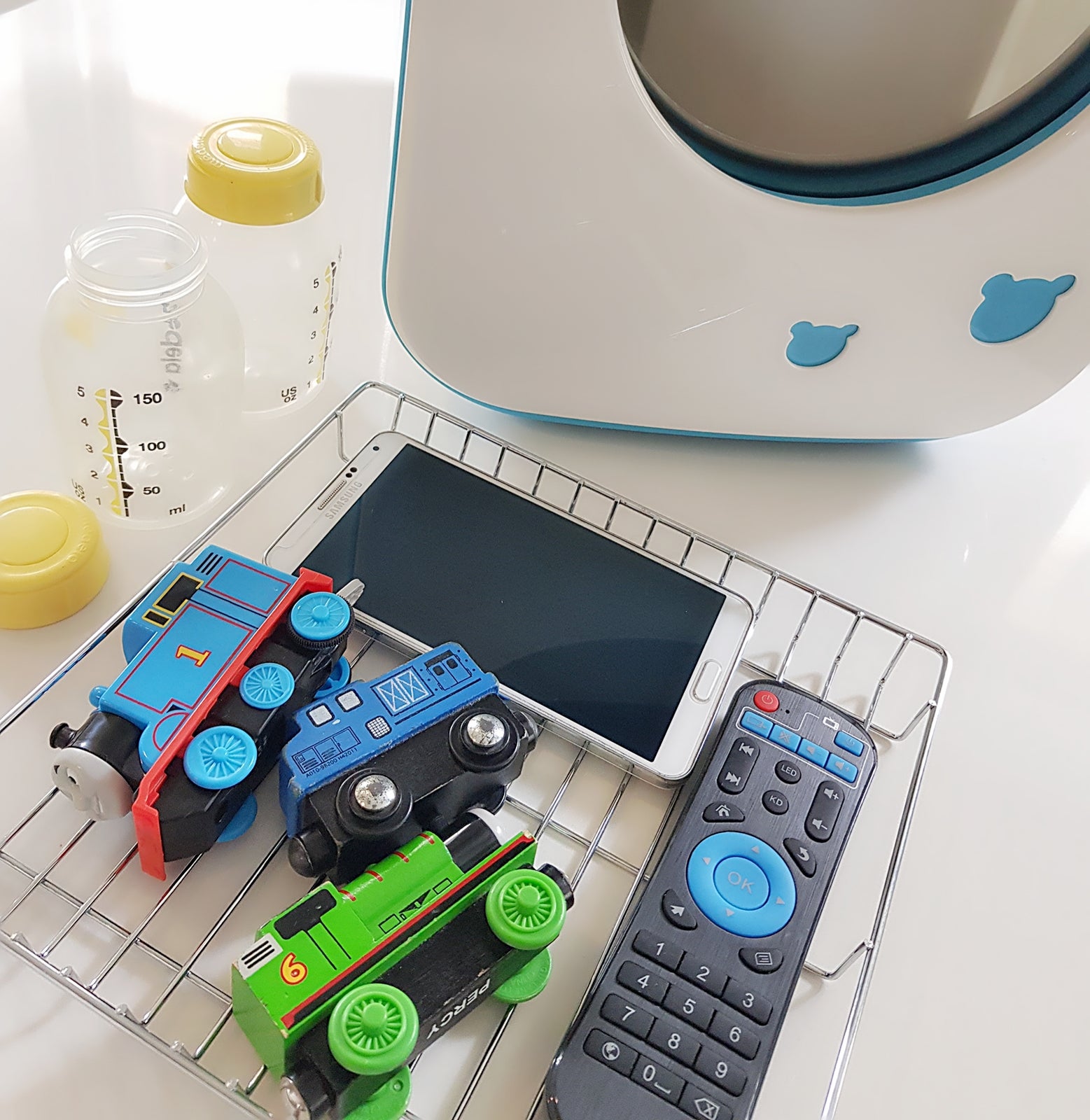 How could UV steriliser for milk bottles prevent babies from getting sick?